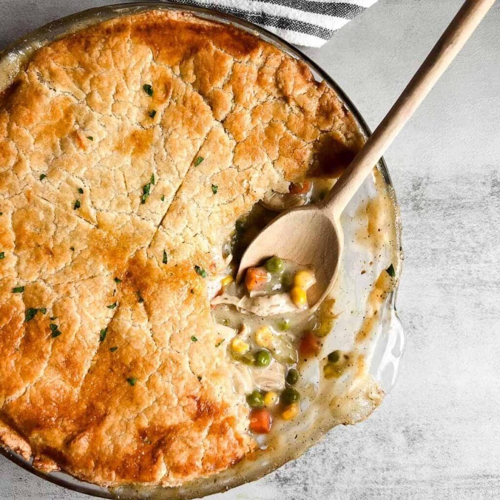 Savory gluten free vegetable pie with a flaky golden crust and flavorful mixed vegetable filling.